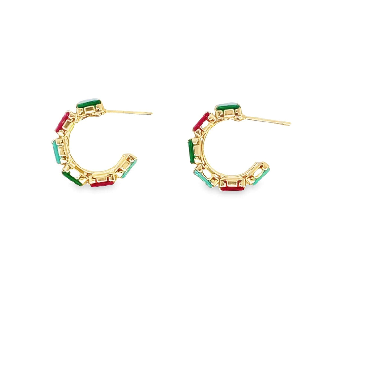A pair of gold hoop earrings features alternating green and red rectangular stones.