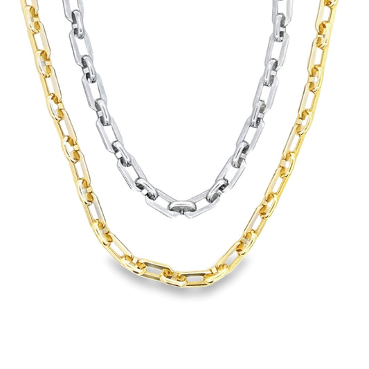 Two layered chain necklaces, one in polished silver and the other in gold, showcase interlocking rectangular links.