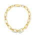 A polished gold paperclip link bracelet rests in a circle against a clean white background.