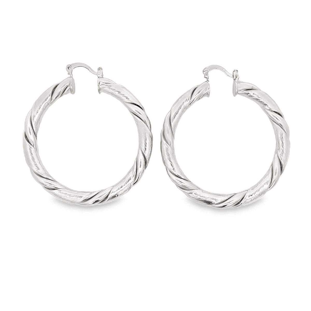 A pair of shiny silver twisted hoop earrings are displayed against a clean white background.