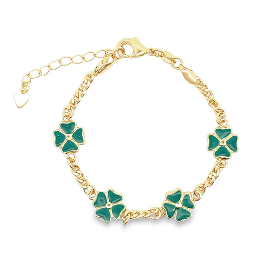 A gold-plated link bracelet features four green enamel clover charms spaced evenly along the chain.