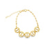 A gold chain bracelet features five interlocking circular designer-style charms and an adjustable extension chain against a clean white background.