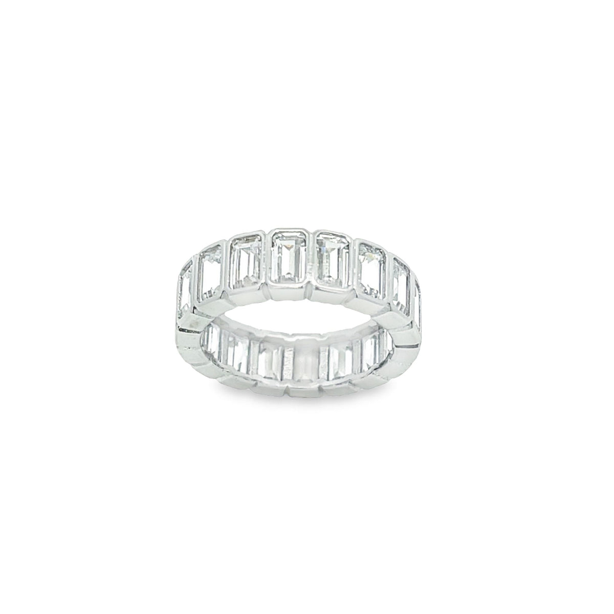 A platinum eternity band features a continuous line of sparkling emerald-cut diamonds against a clean white background.