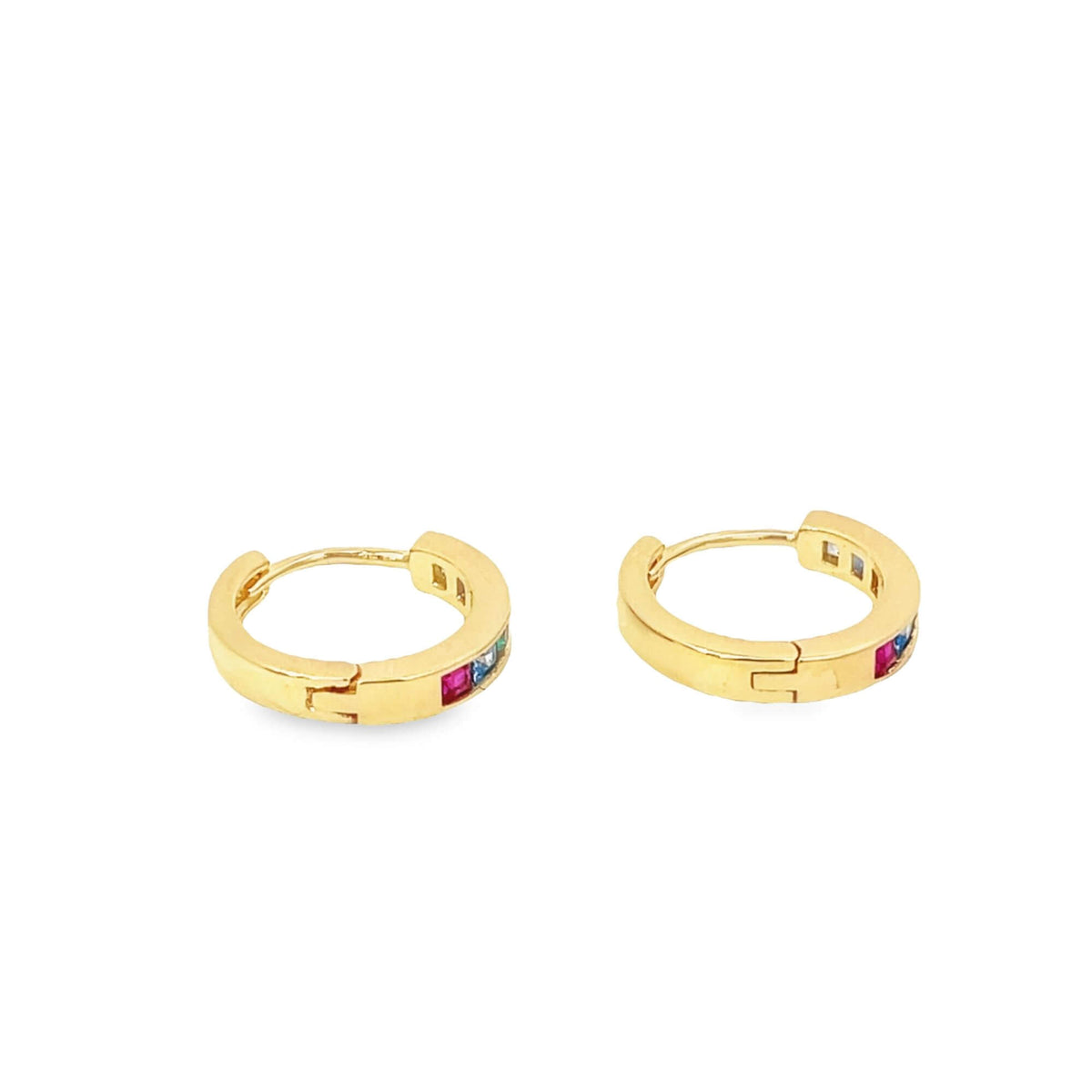 A pair of gold huggie hoop earrings features colorful baguette stones embedded along the front against a clean white background.