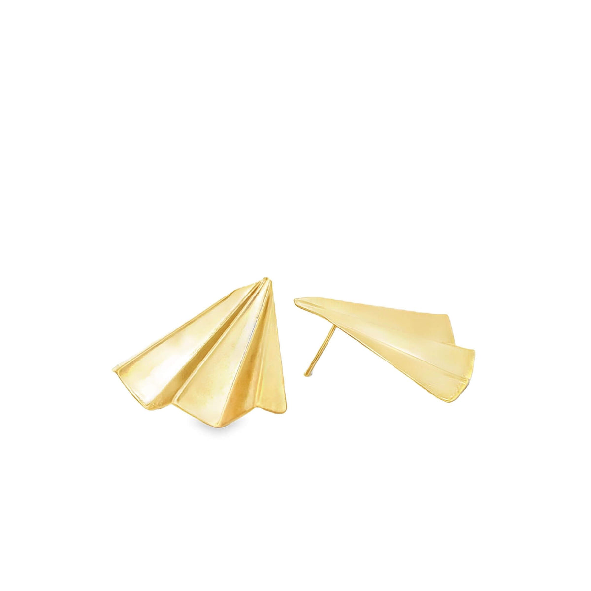 A pair of polished gold paper airplane stud earrings rests against a clean white background.
