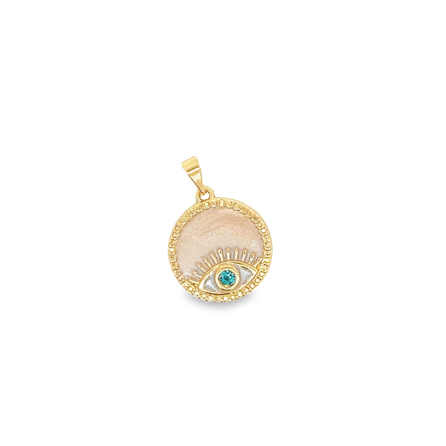 A gold evil eye pendant features a shimmering mother-of-pearl background and a sparkling turquoise crystal pupil.