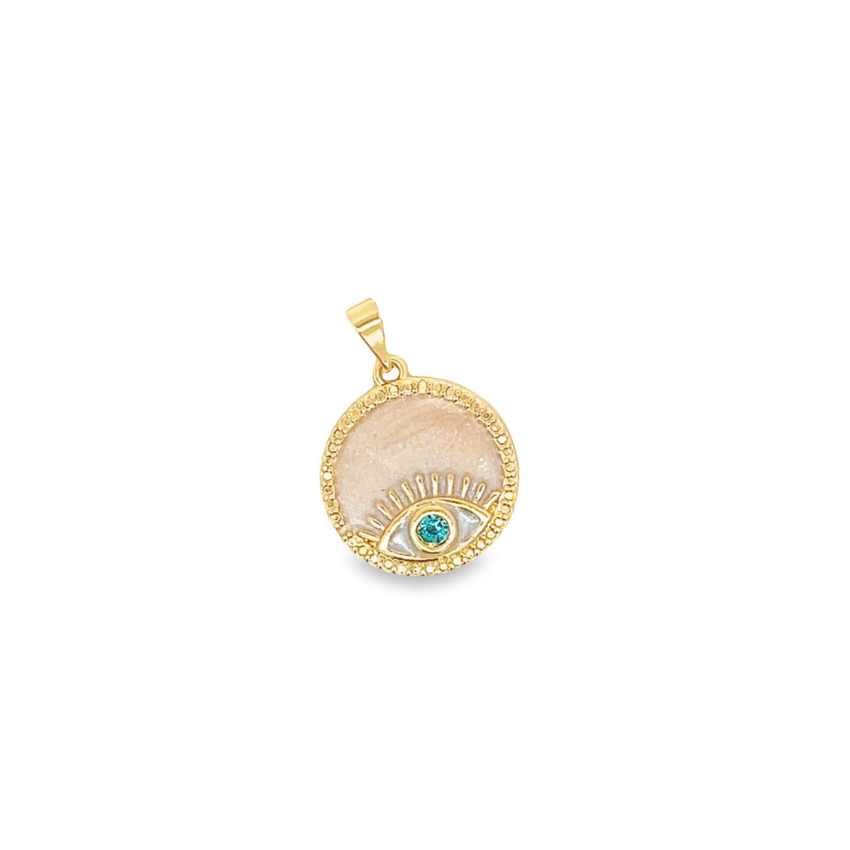 A gold evil eye pendant features a shimmering mother-of-pearl background and a sparkling turquoise crystal pupil.