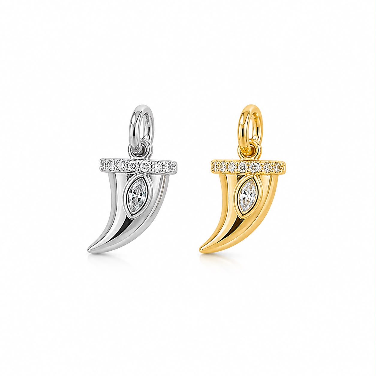 Elegant horn charm featuring a marquise-cut cubic zirconia with pavé accents. Crafted in 18K Gold Filled and Rhodium. Perfect for necklaces, hoops, bracelets, and personalized jewelry.