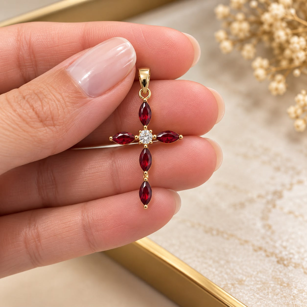 Shop an elegant marquise cross pendant crafted in 18K Gold Filled. Featuring faceted marquise-cut stones and a refined statement design available in multiple color options.