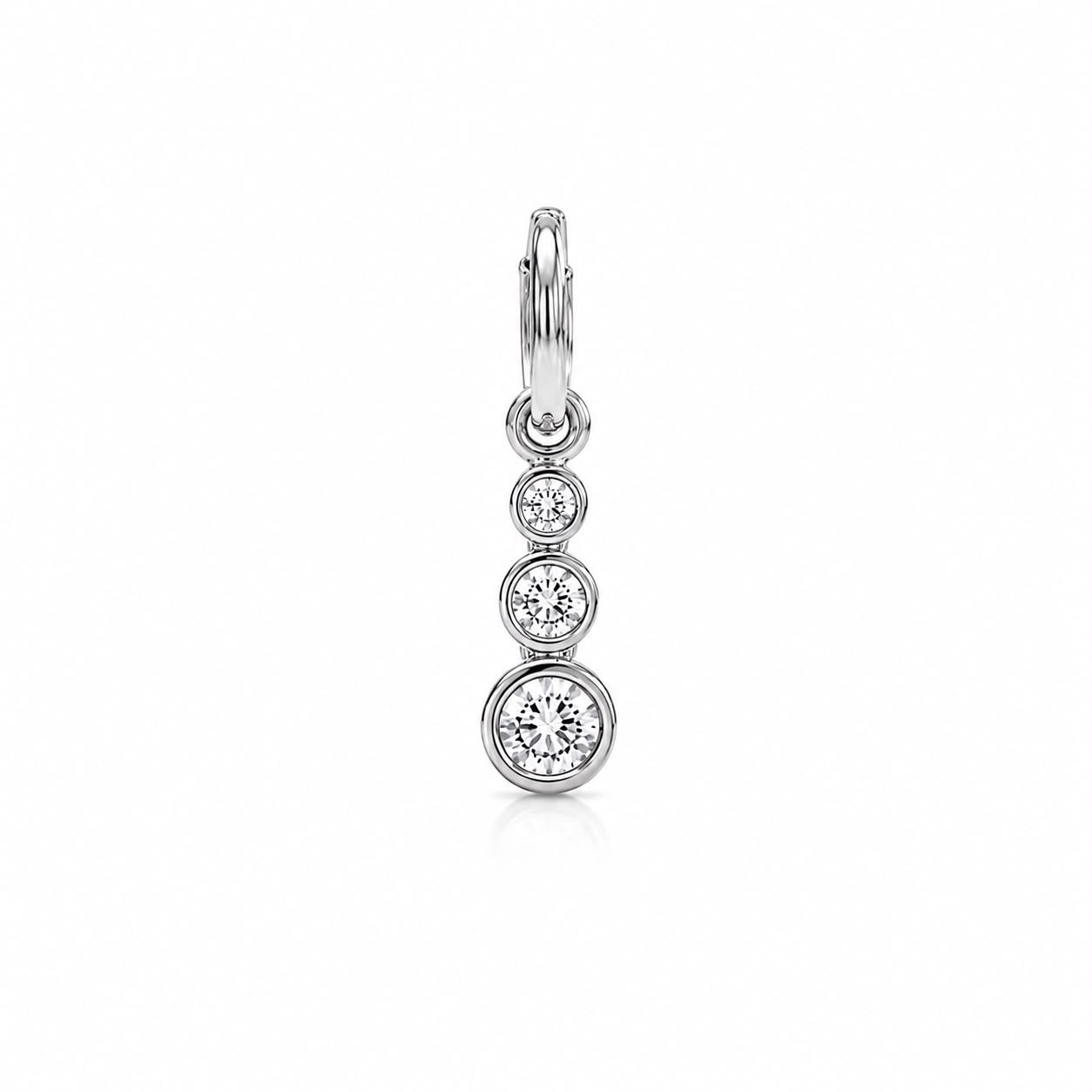Add timeless sparkle with this Triple Bezel CZ Drop Charm crafted in durable 18K Gold Filled. Features three graduated bezel-set cubic zirconia stones for a delicate, elegant look.
