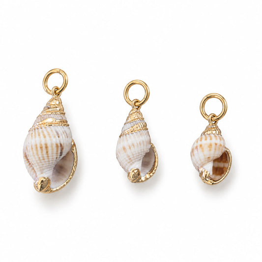 Shop a sophisticated seashell pendant with polished 18K Gold Filled detailing. Coastal-inspired statement jewelry available in multiple sizes.