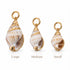 Shop a sophisticated seashell pendant with polished 18K Gold Filled detailing. Coastal-inspired statement jewelry available in multiple sizes.
