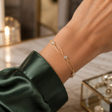 Delicate Gold Filled Bracelet necklace featuring elongated oval links and sparkling cubic zirconia stations. Lightweight, elegant, and perfect for layering.