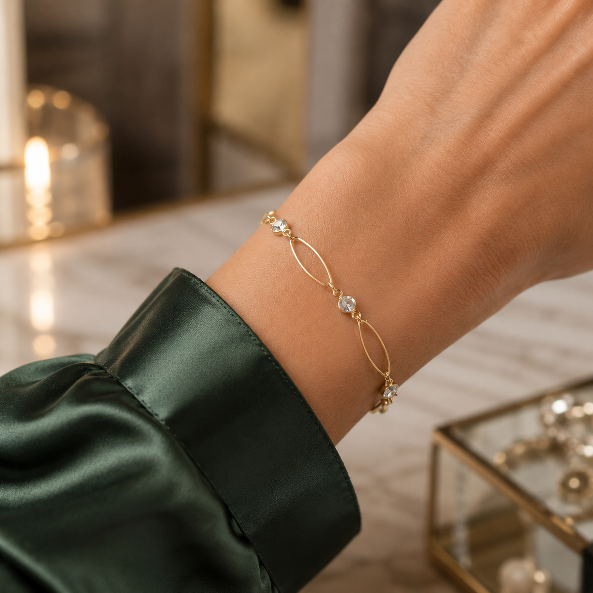 Delicate Gold Filled Bracelet necklace featuring elongated oval links and sparkling cubic zirconia stations. Lightweight, elegant, and perfect for layering.