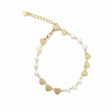 Elegant 18K Gold Filled station necklace featuring textured heart charms and heart-shaped synthetic pearls. Lightweight, feminine and perfect for everyday wear.