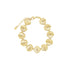 A gold seashell charm bracelet featuring a delicate chain with a lobster clasp rests against a clean white background.
