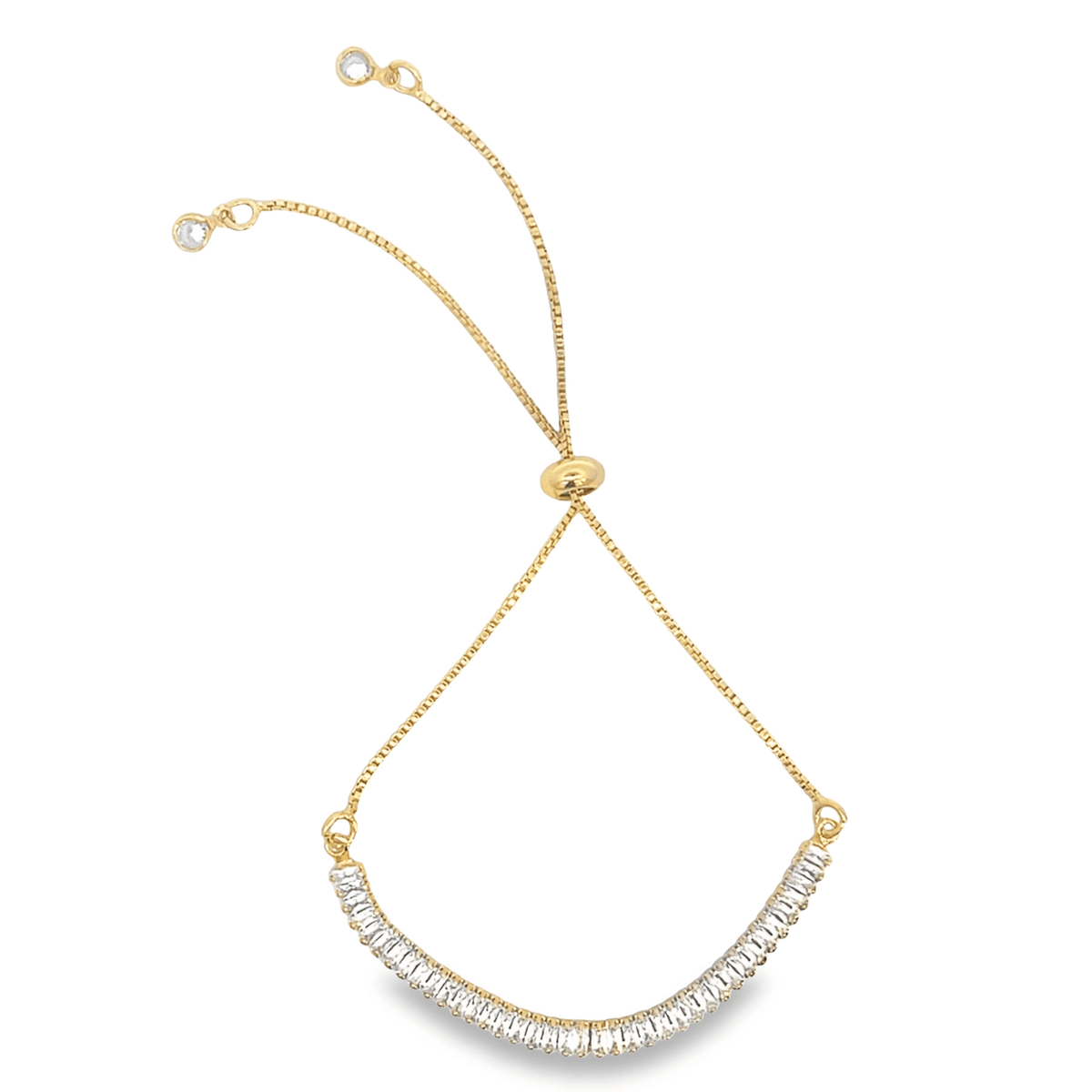 A delicate gold bolo bracelet features a curved arch of sparkling baguette-cut diamonds along the bottom.