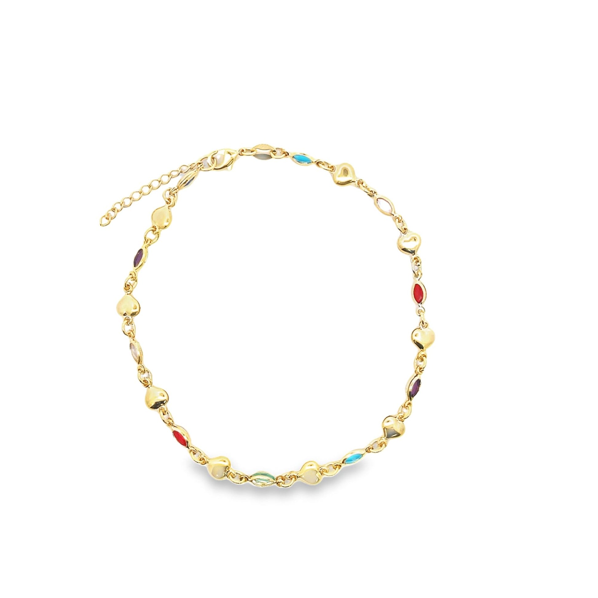 A delicate gold chain necklace sparkles against a white background, featuring alternating small heart charms and colorful gemstone inlays.