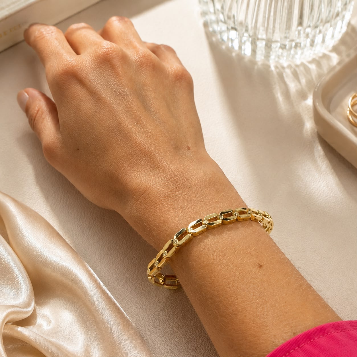 Elegant 18K Gold Filled geometric link bracelet featuring polished open links accented with sparkling cubic zirconia. Modern, lightweight and perfect for everyday wear.