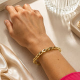 Elegant 18K Gold Filled geometric link bracelet featuring polished open links accented with sparkling cubic zirconia. Modern, lightweight and perfect for everyday wear.
