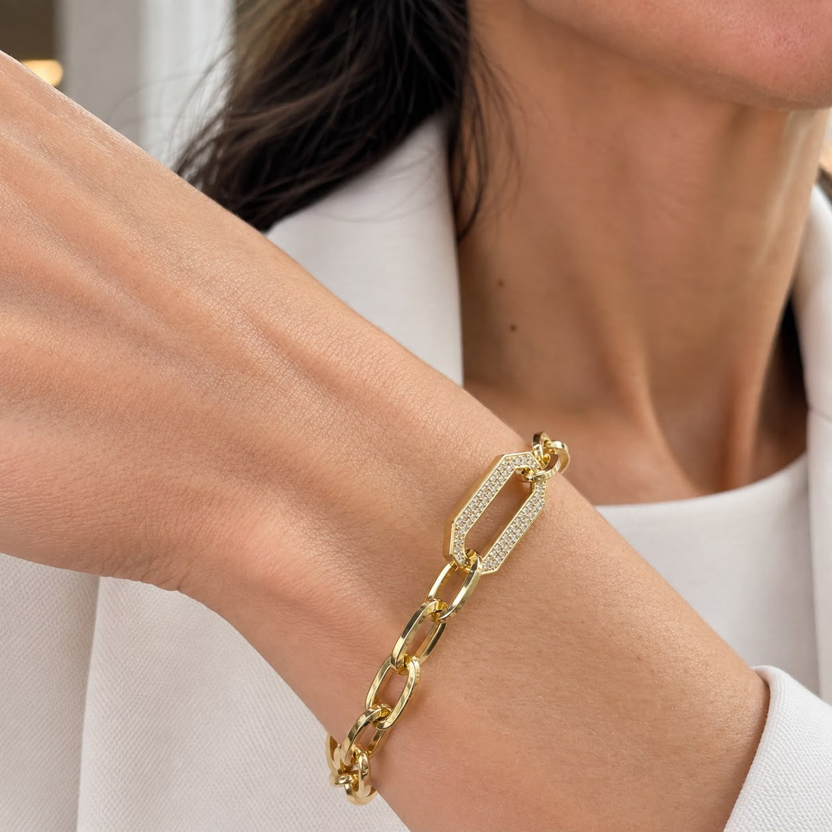 Shop the Thick Oval Paperclip Bracelet featuring pave CZ geometric links. Available in 18K Gold Filled and Rhodium Filled for a bold, elegant finish.