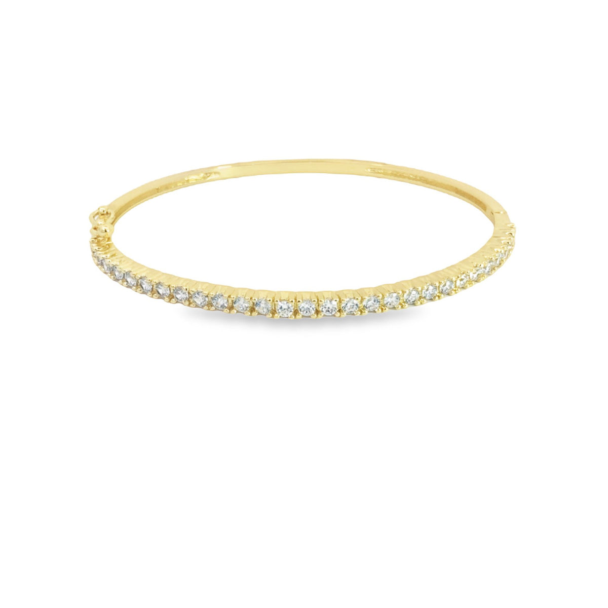 A sleek gold bangle bracelet sparkles with a continuous row of pave-set diamonds against a clean white background.