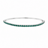 Elegant slim tennis bangle bracelet with sparkling colored CZ stones. Stackable minimalist design available in multiple color options for everyday luxury styling.