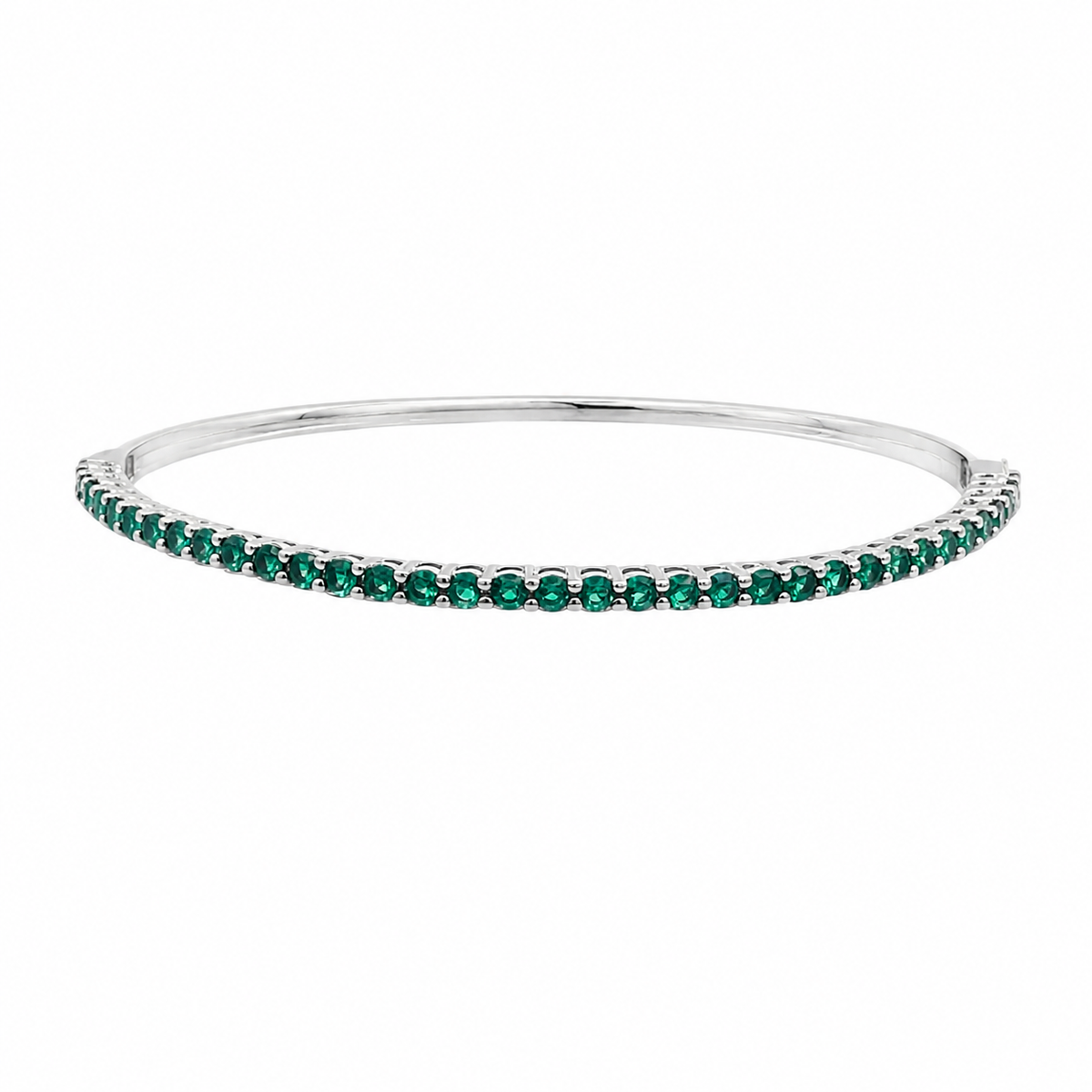 Elegant slim tennis bangle bracelet with sparkling colored CZ stones. Stackable minimalist design available in multiple color options for everyday luxury styling.