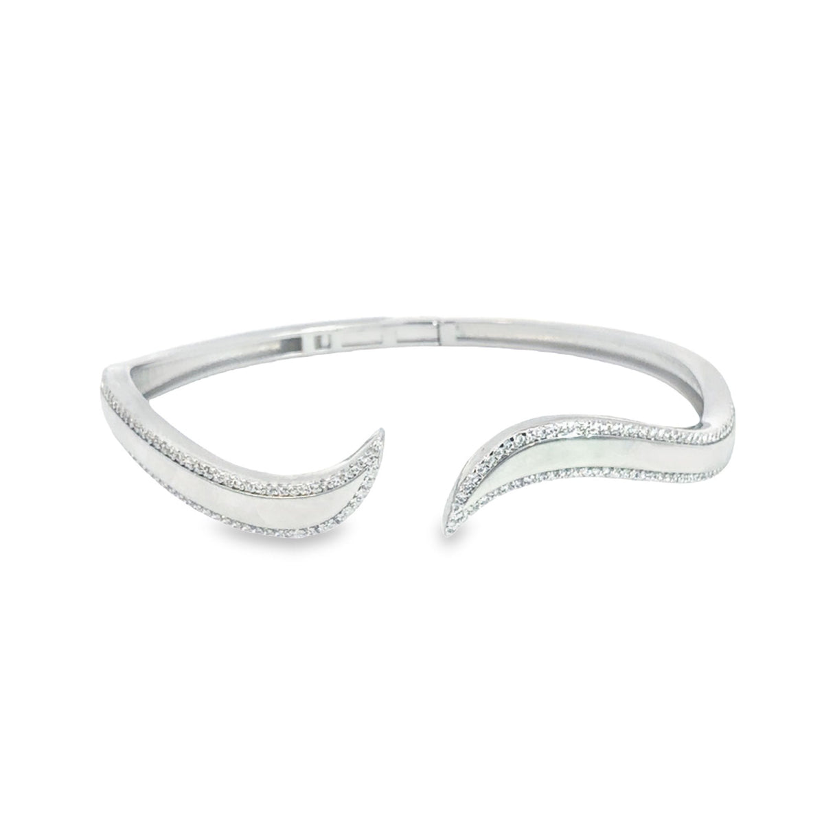 A sleek white gold bangle bracelet curves gracefully with shimmering diamond accents along its edges against a clean white background.