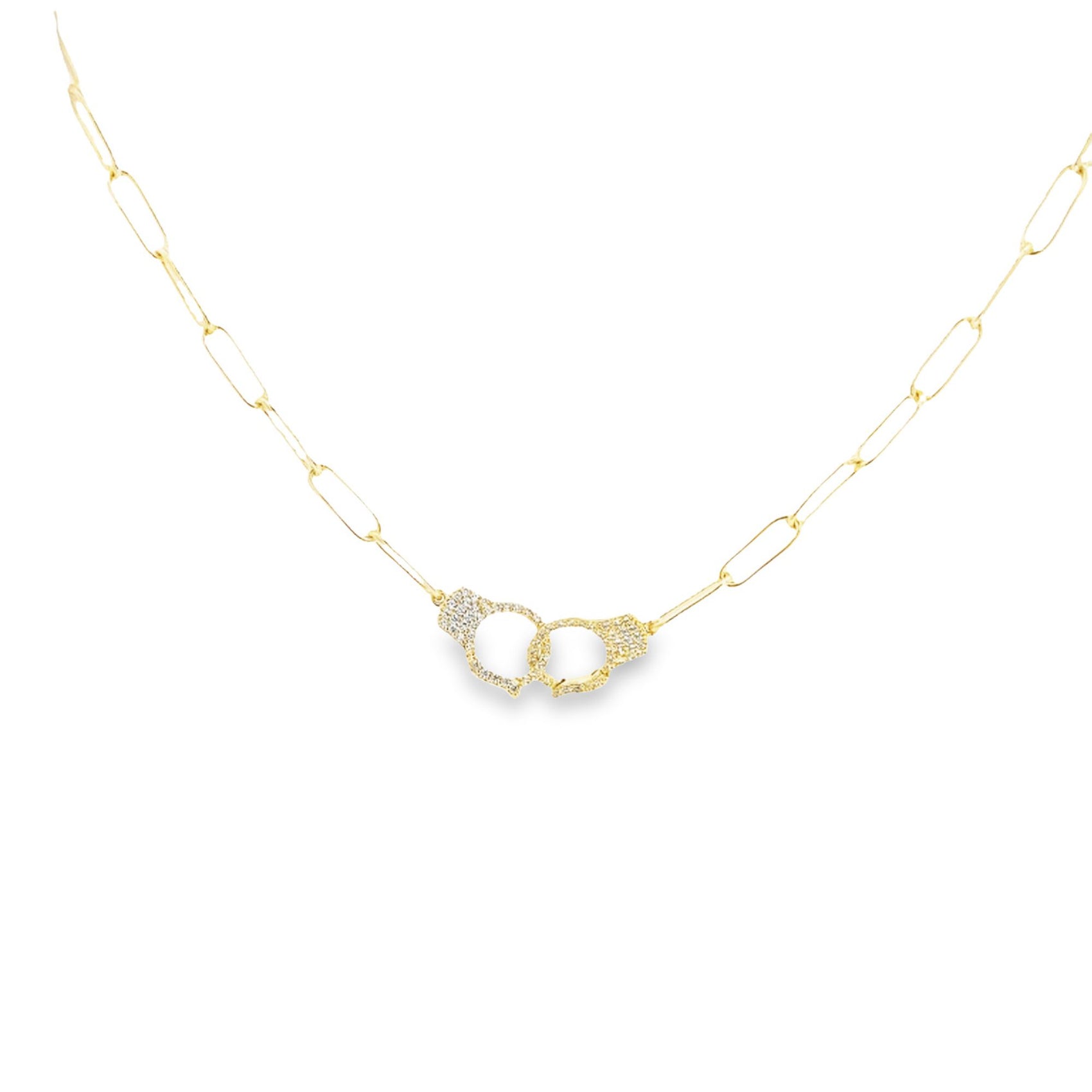 A delicate gold paperclip chain necklace features a sparkling diamond-encrusted handcuff pendant at the center.