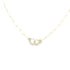 A delicate gold paperclip chain necklace features a sparkling diamond-encrusted handcuff pendant at the center.