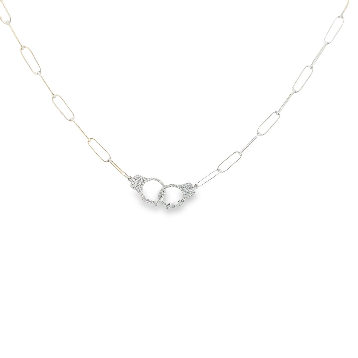 A sterling silver paperclip chain necklace features a delicate handcuff pendant encrusted with shimmering pavé diamonds.