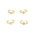 Four gold chain rings feature distinct crystal settings in round, marquise, square, and teardrop shapes.