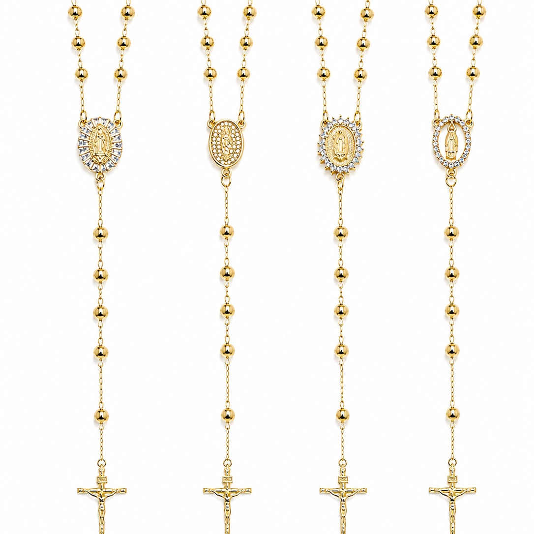 Elegant Catholic rosary necklace crafted in 18K gold filled finish featuring cross pendants and religious medal styles including Saint Jude and Guadalupe. A timeless faith-inspired necklace perfect for layering or everyday wear.
