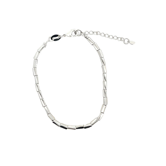 A silver metallic tube bead bracelet rests against a plain white background, featuring a secure lobster clasp and an adjustable extension chain.