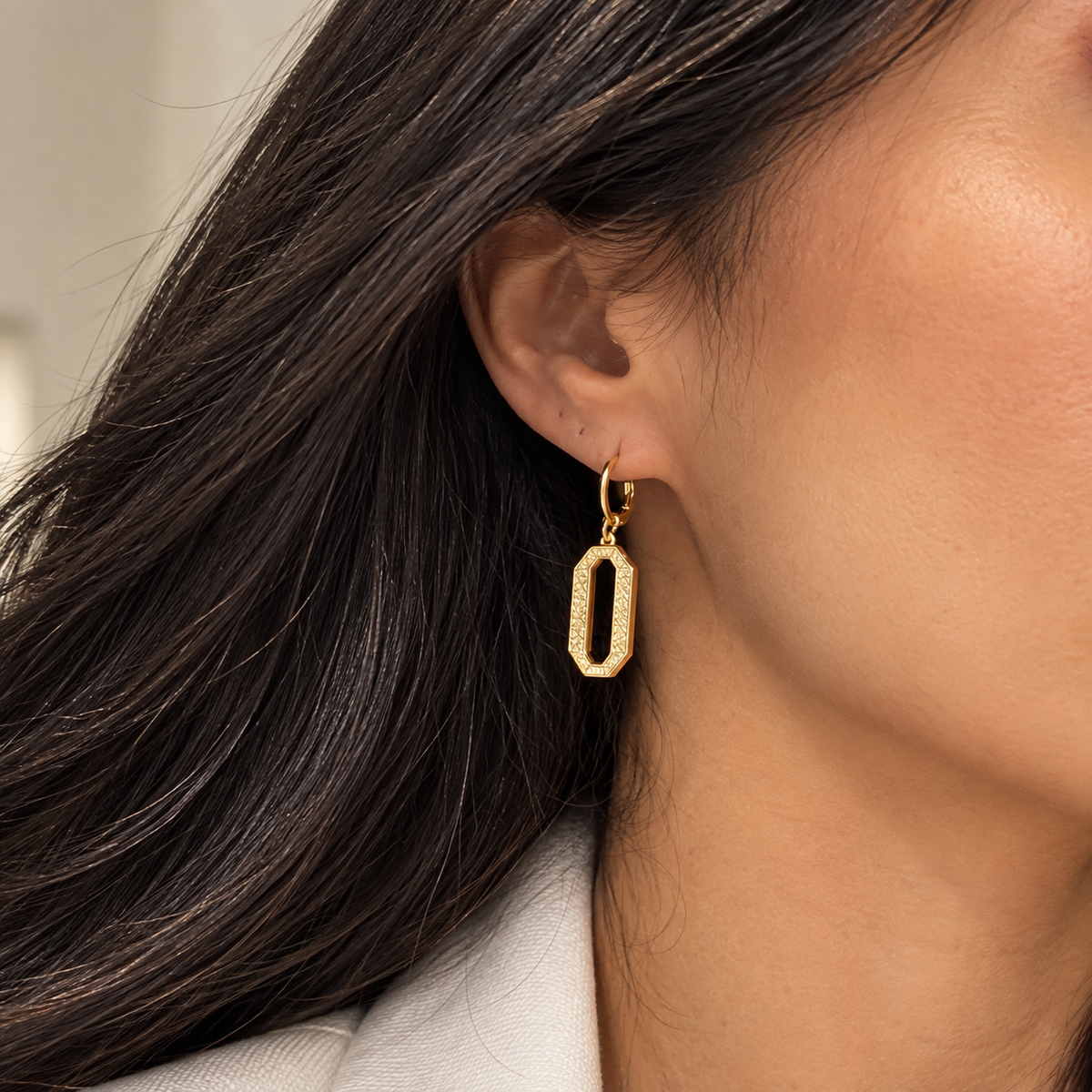 Shop Oval Paperclip Earrings with CZ, featuring an elongated open-link design and sparkling cubic zirconia for a modern statement look.