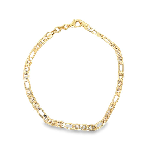 A polished yellow gold Figaro chain bracelet rests against a clean white background, showcasing its classic alternating link design.