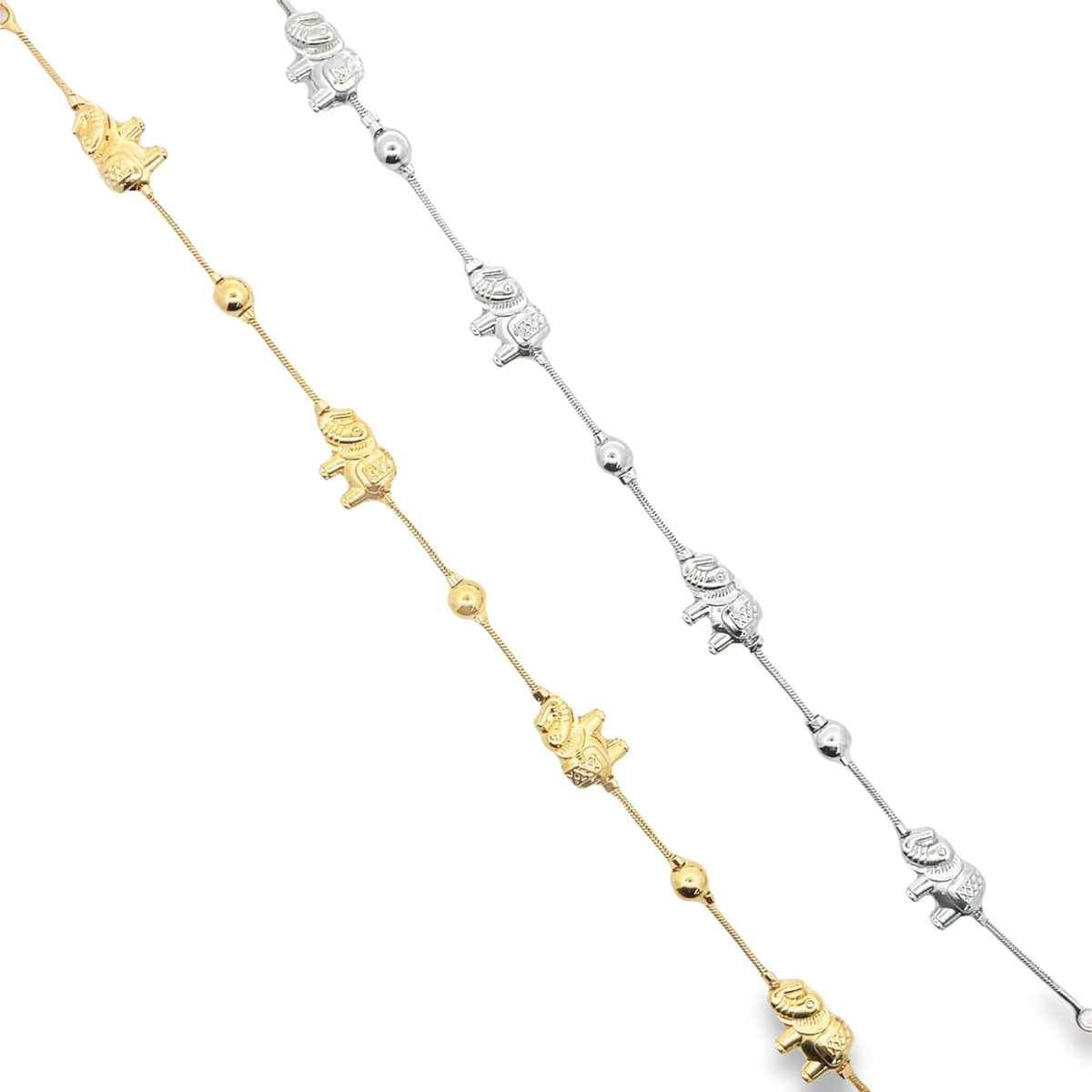 Two delicate gold and silver elephant charm bracelets feature intricately detailed animal figurines and interspersed bead accents against a clean white background.