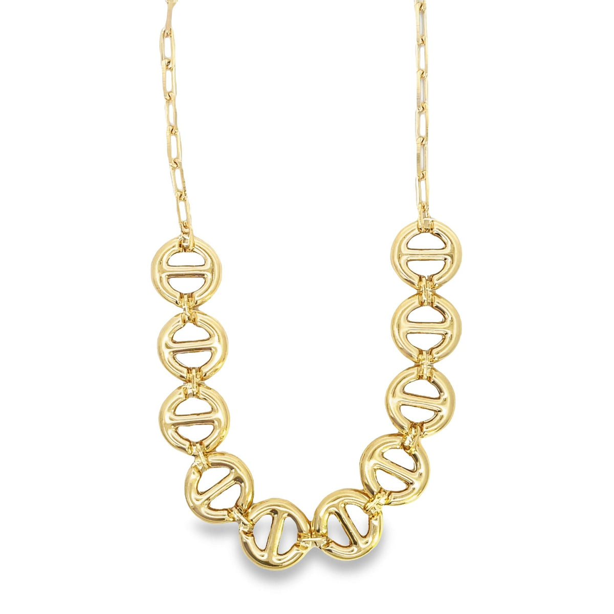 A gold link necklace features large, interconnected circular geometric pendants hanging from a delicate chain.