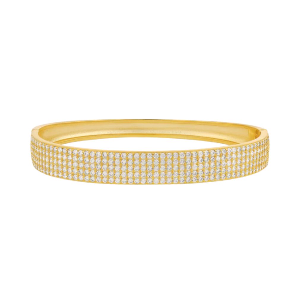 A gold pave diamond bangle bracelet sparkles against a clean white background.