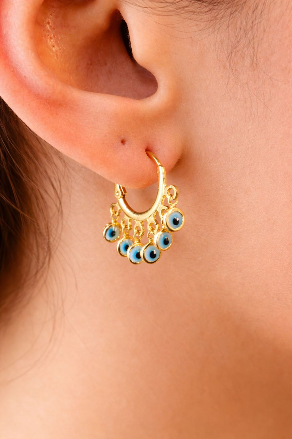 Stylish 18K gold filled evil eye charm earrings. Tarnish-resistant, lightweight and perfect for everyday wear with a meaningful touch.