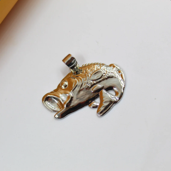 A shiny silver bass fish pendant rests on a clean white background.