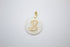 A round white pendant features an ornate gold initial B in the center.