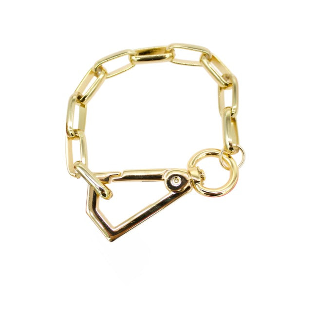 A shiny gold chain bracelet features an interlocking link design secured with a lobster clasp closure.