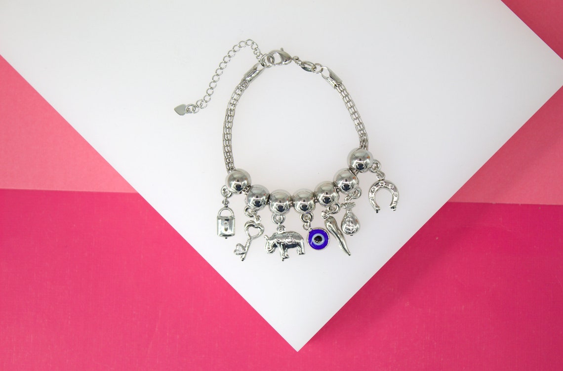 Charm Bracelet With Lock, Key, Evil Eye, Money, Horse Shoe Luck Charms (I407)