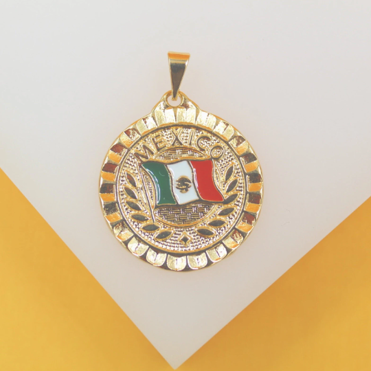 A gold pendant features an enameled Mexican flag design with the word Mexico written above it.