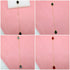 Four gold lariat necklaces feature teardrop-shaped gemstone pendants in black, green, blue, and red against a pink background.