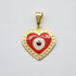 A gold heart-shaped pendant features a vibrant red enamel background surrounding a protective blue and white evil eye symbol.