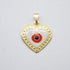 A gold heart pendant features a white enamel evil eye design with a red and black center.