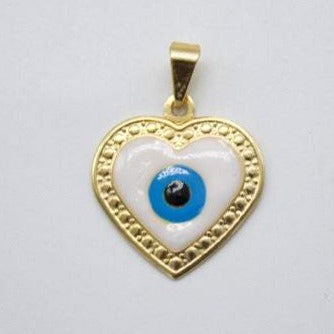 A gold heart-shaped pendant features a white enamel evil eye symbol with a blue and black center.